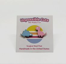 Load image into Gallery viewer, Unpossible Cuts Brontosaurus &amp; Stegosaurus Dinosaur Handmade Stud Earrings
